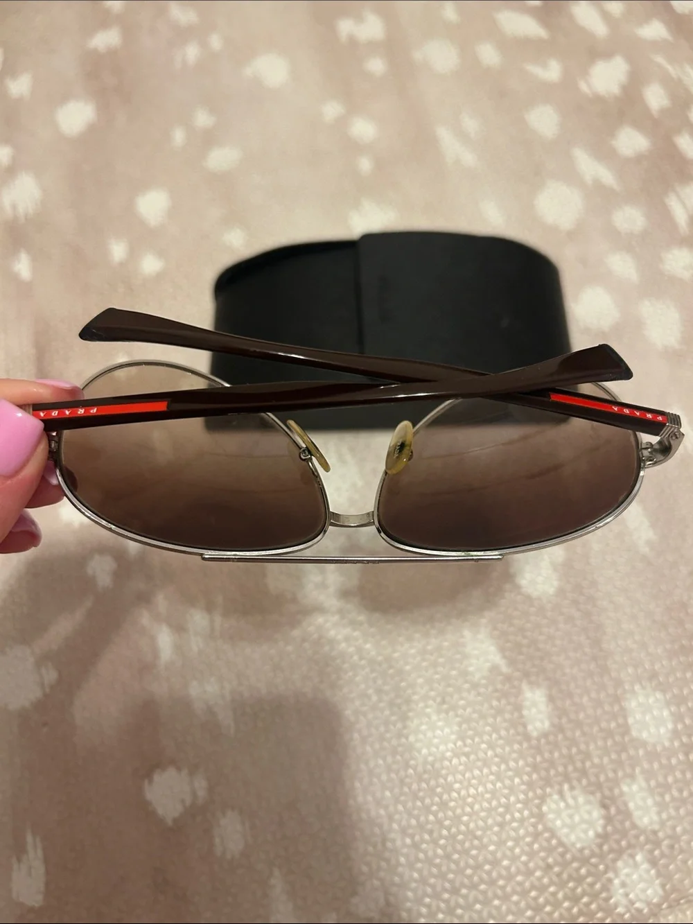 Prada Silver Frame Sunglasses with Brown Gradient Lenses